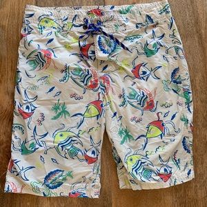 Cream colored swimming trunks with colorful fish!